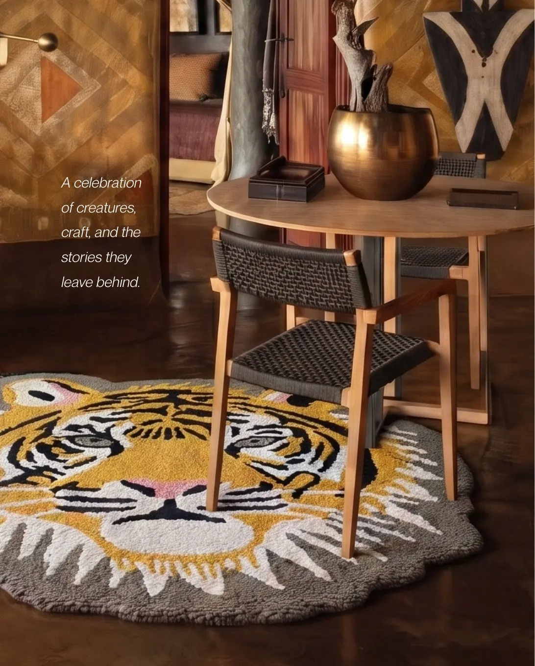 A round tiger-face tufted rug under a wooden table and chair