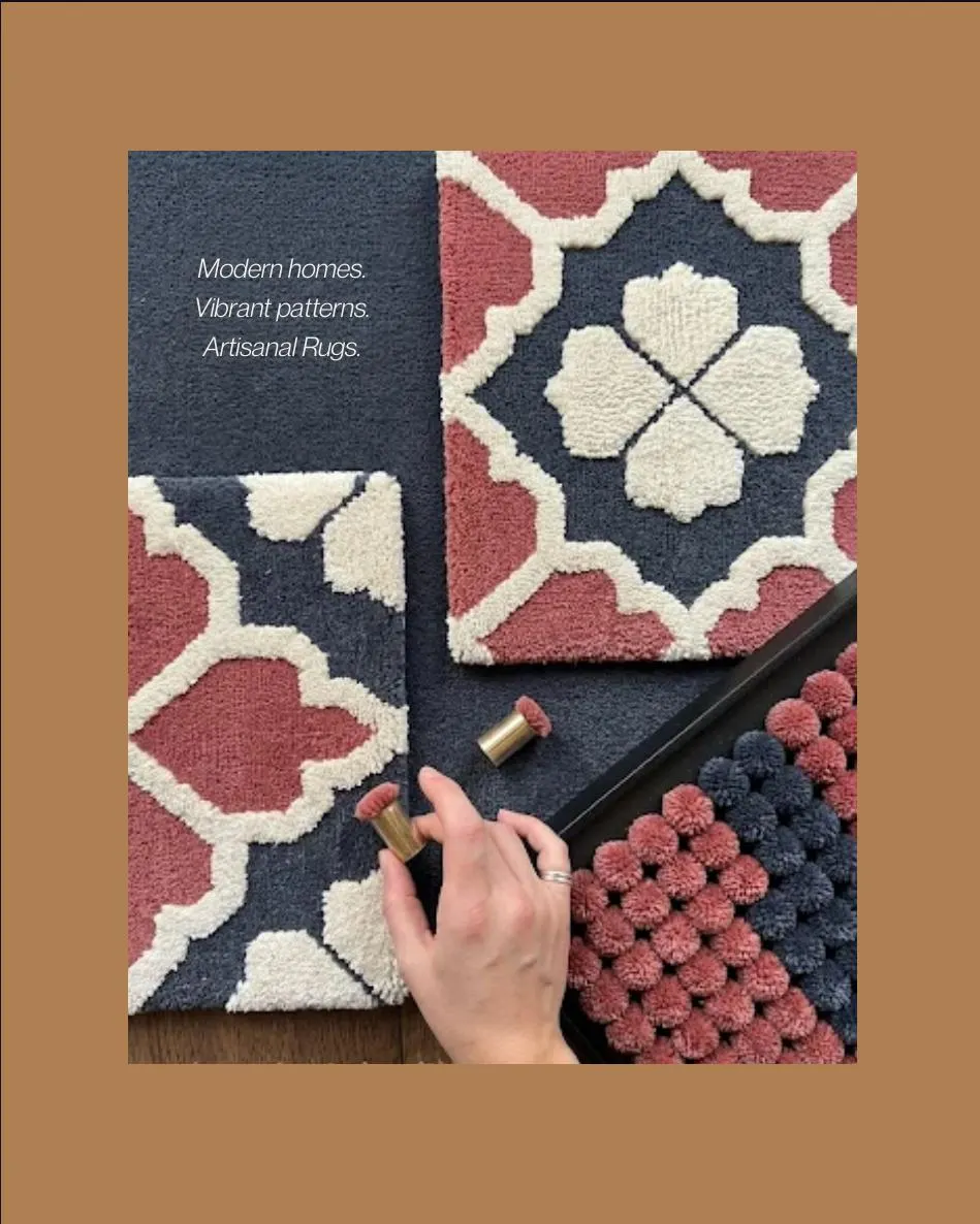 Hand-tufted rugs in navy, rose and ivory lattice patterns, with a hand holding a tool. Text reads Modern frames, vibrant patterns, artisanal rugs.